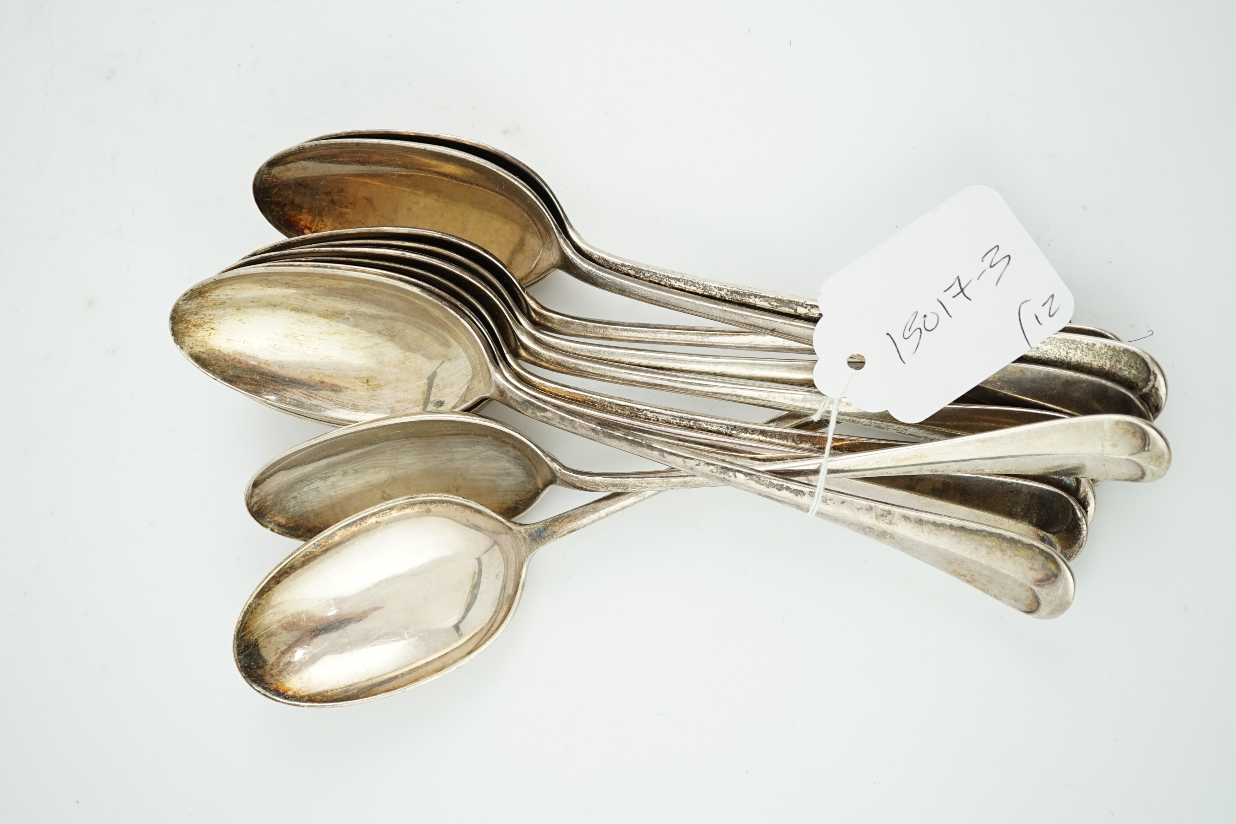 A set of twelve George V silver Hanovarian rat-tail table spoons, by James Dixon & Sons